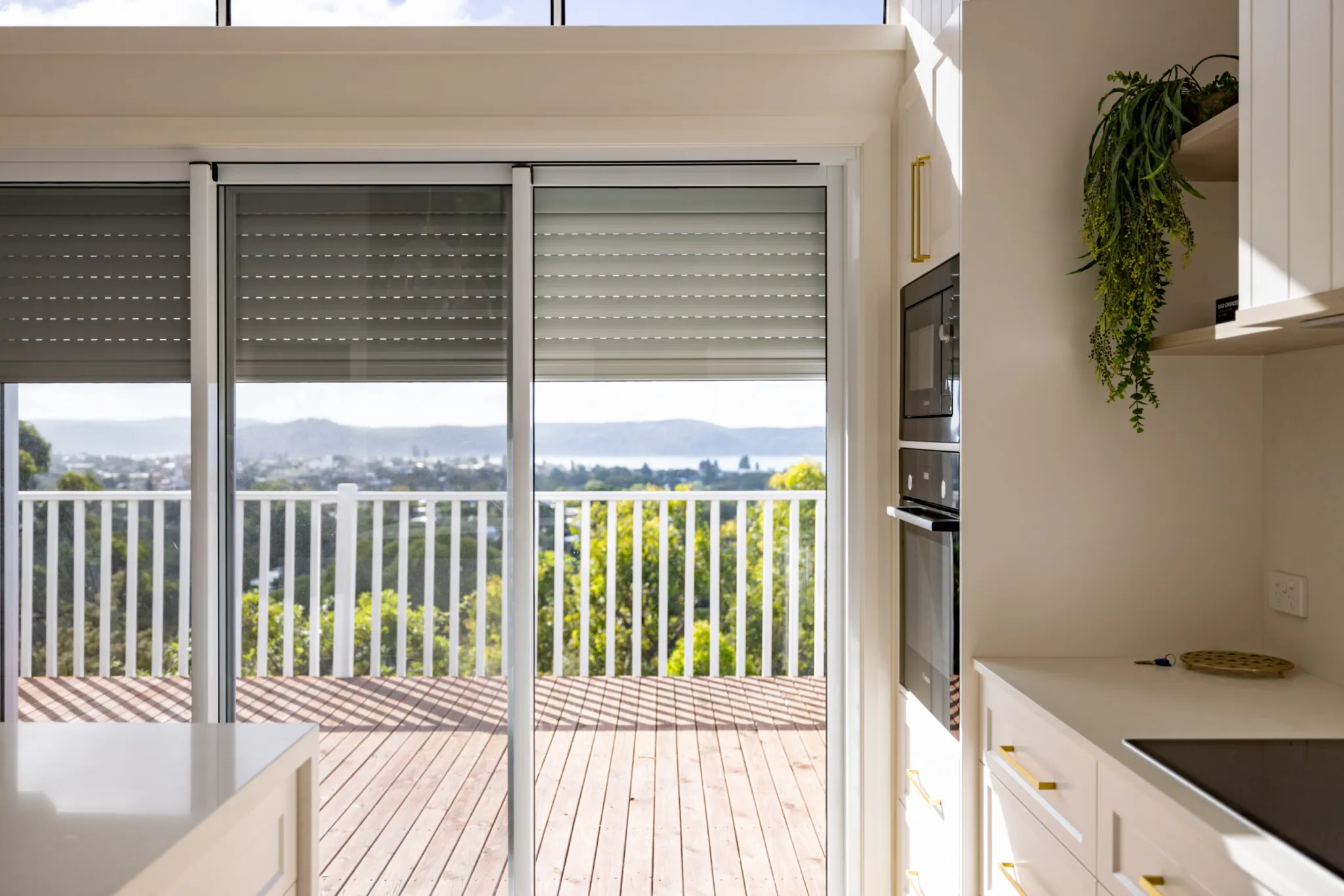 Interior with roller shutters — Central Coast